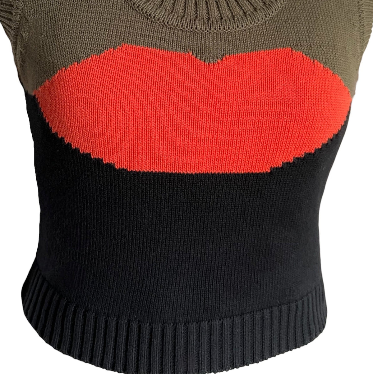 Khaki and black knitted vest with orange lip motif design.