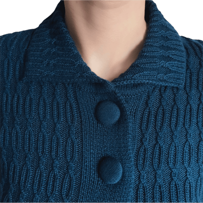 Close-up of a blue textured cardigan with buttons on a white background