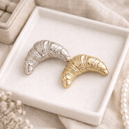 Vintage style Gold and silver croissant brooch in the trinket plate