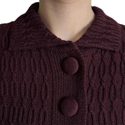 Dark purple burgundy chunky knit close up with knit covered buttons