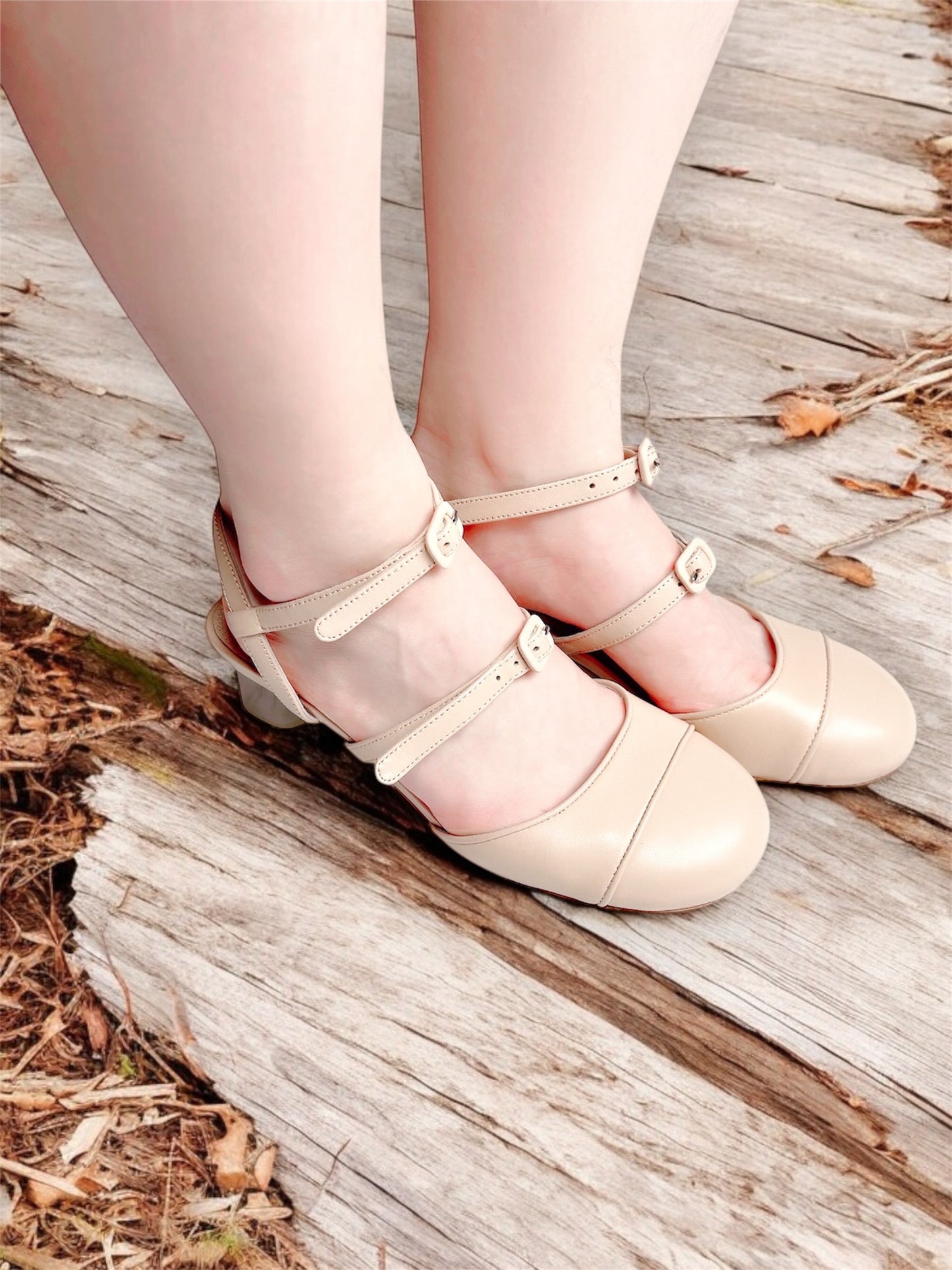 Model wearing beige leather Mary Jane pumps - vintage-inspired double buckle heels