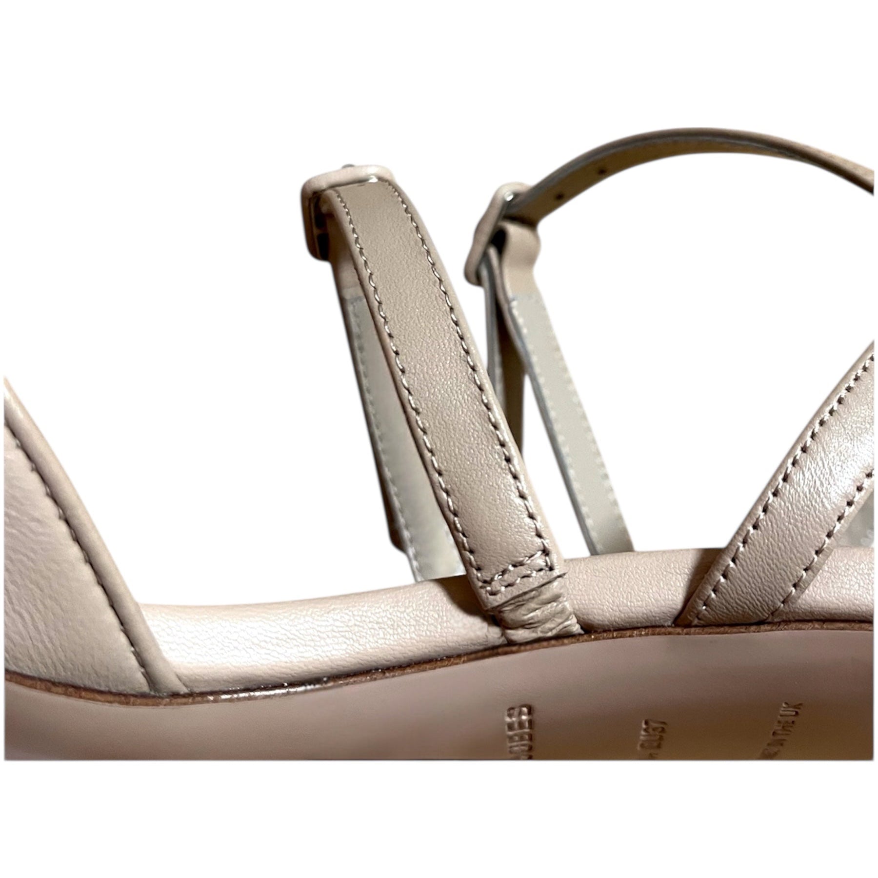 Close-up of a beige sandal straps