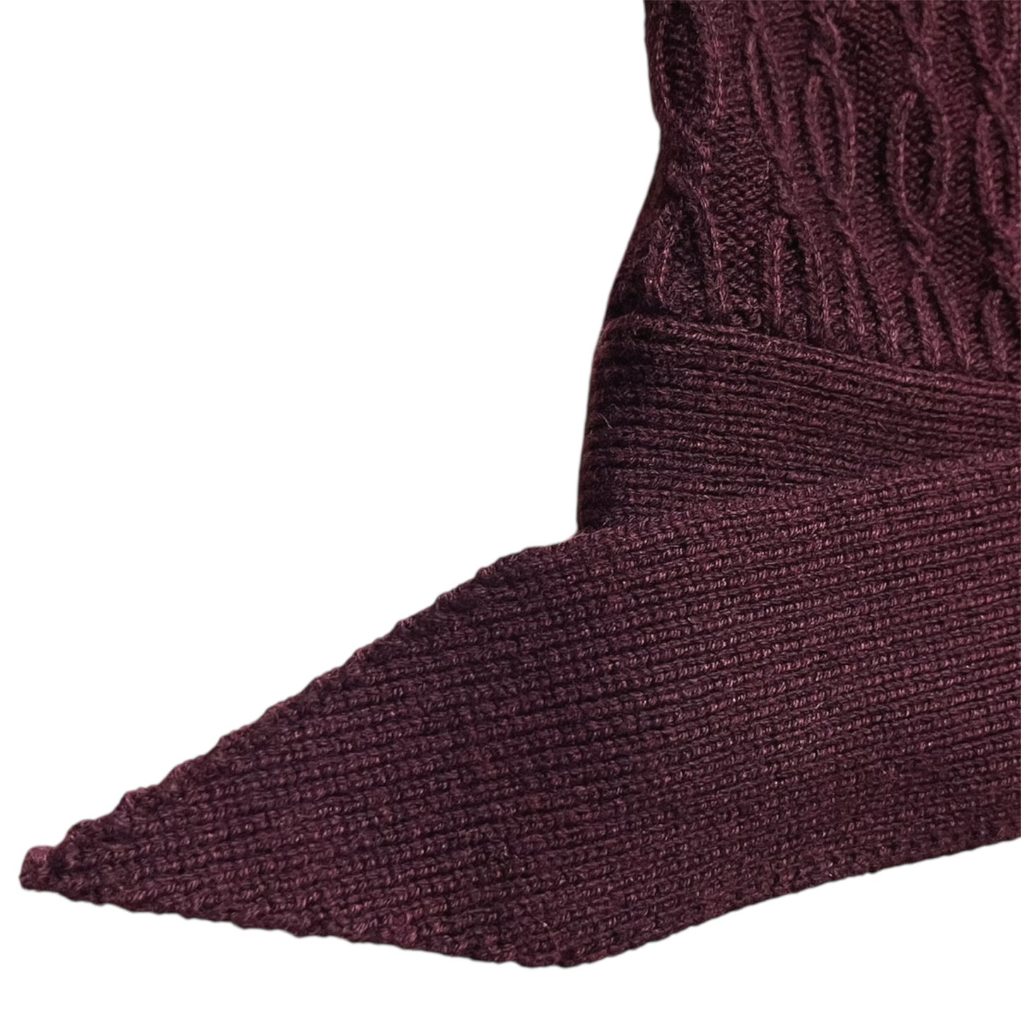 Close-up of a dark red  knitted belt
