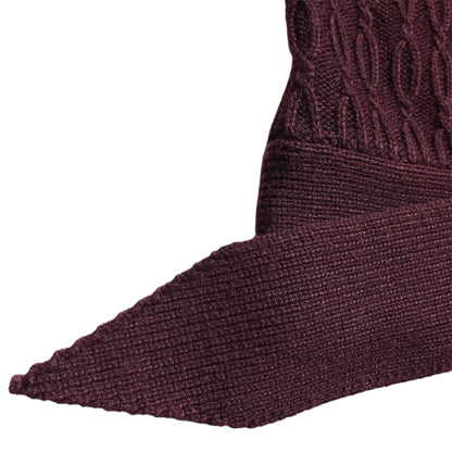 Close-up of a dark red  knitted belt