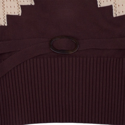 Close up of the brown and beige knitted top with brown knitted belt.