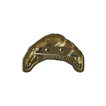gold croissant brooch back view